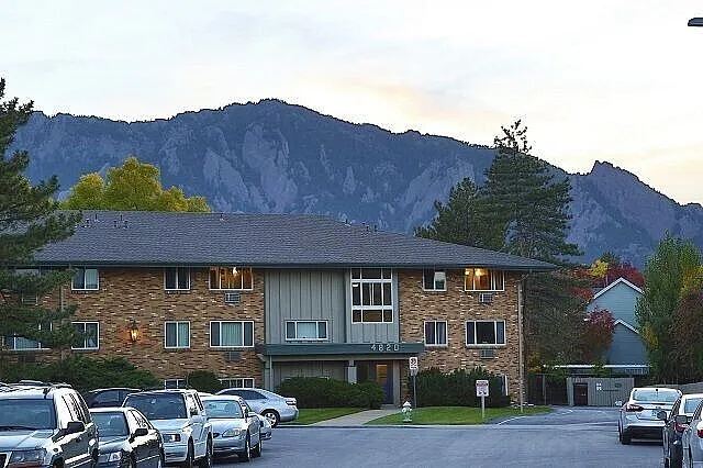 Kimberly Court apartment building in South Boulder with the Flatirons in the background