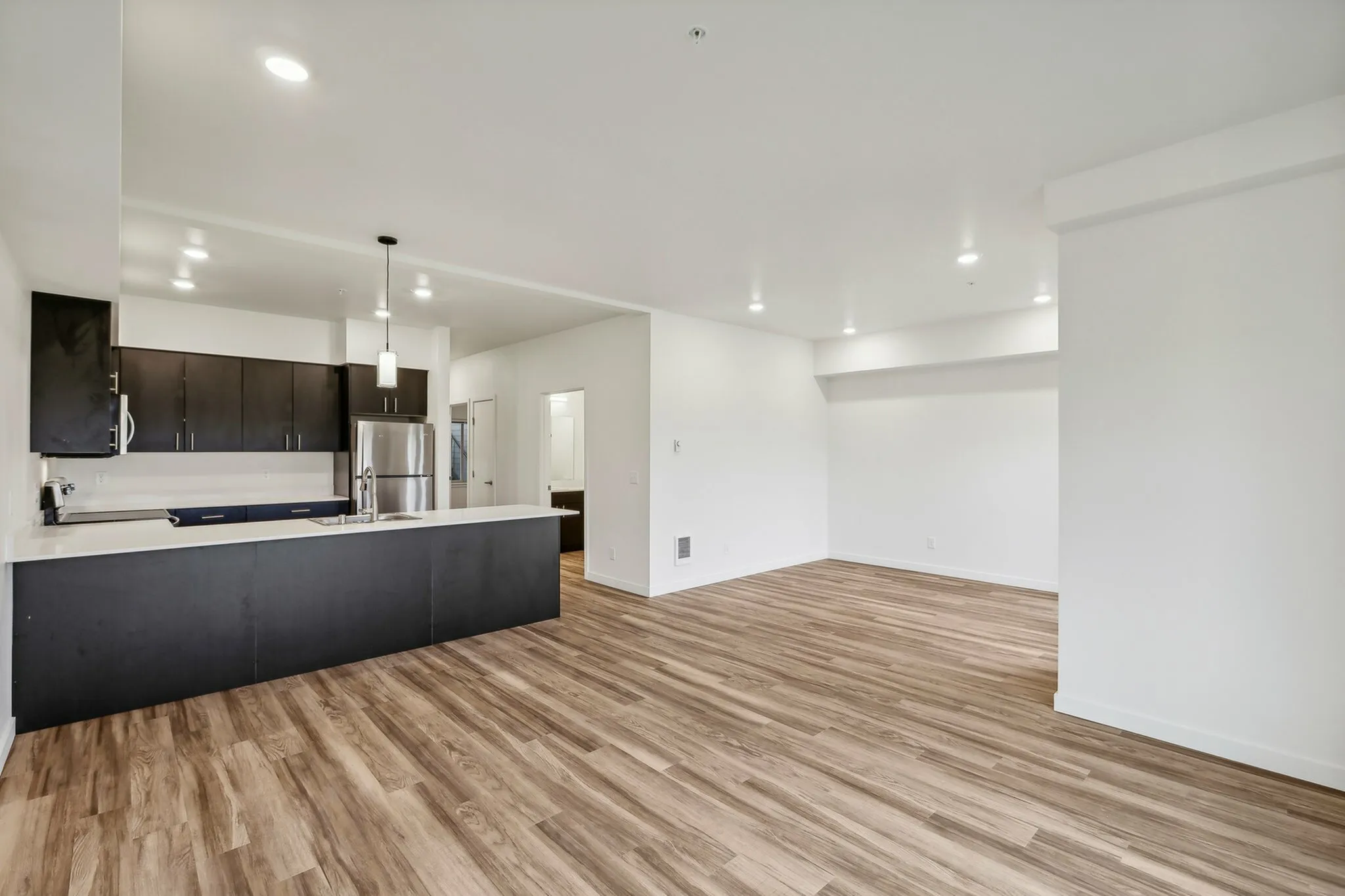 This floorplan features an enormous living area, kitchen, and a flex space for dining, an office, or anything else.