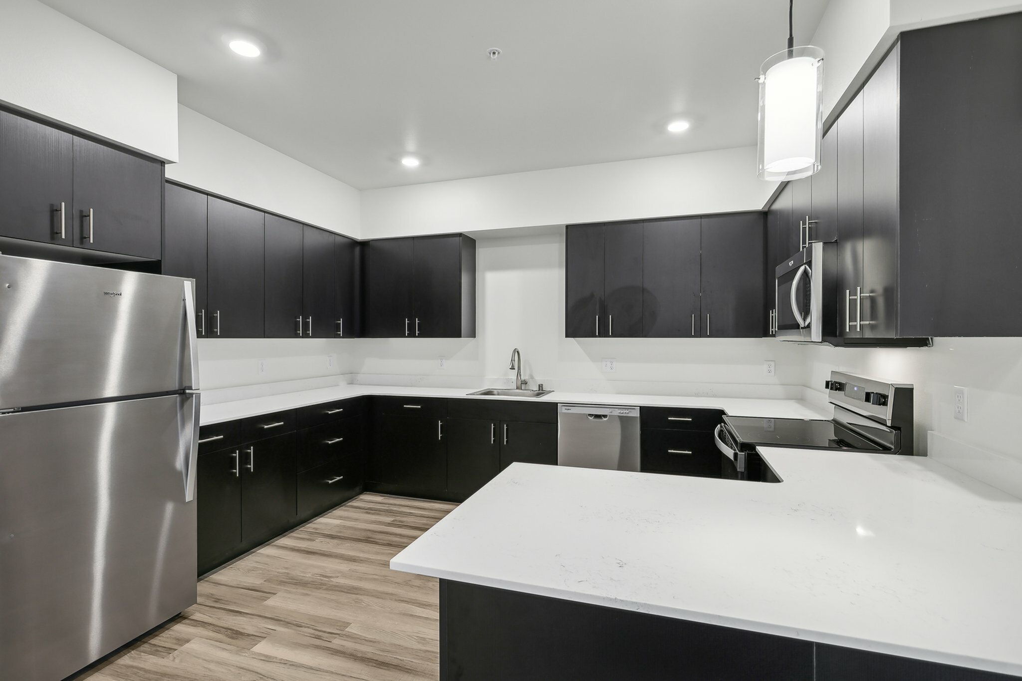 A brand new chef's kitchen with plenty of storage and counterspace