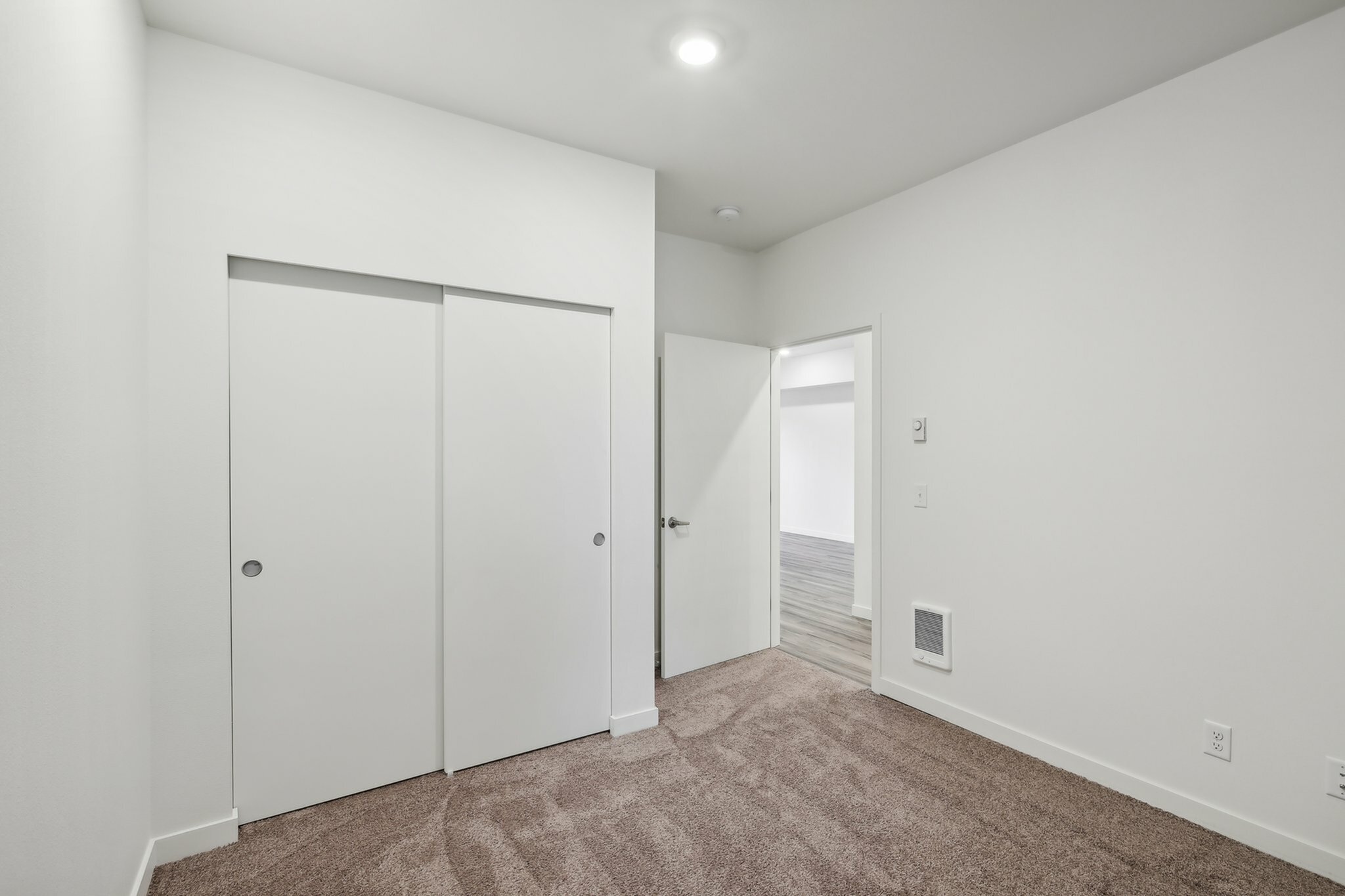2 large bedrooms that are similar in size with cozy new carpet.