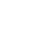 Logo for The Yobi, featuring a geometric heart-shaped icon in teal, yellow, and red on the left, and the text &ldquo;THE YOBI&rdquo; in white..