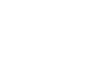 Stacked white logo for Blanton Turner with initials &ldquo;BT&rdquo; in a bold, modern typeface on a transparent background.
