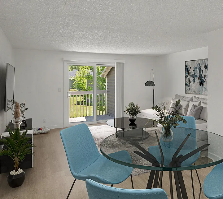 Modern apartment living and dining area with glass table, blue chairs, neutral sofa, and sliding doors opening to a balcony.