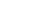 Logo for Blanton Turner featuring abstract geometric design in dark blue and red above the company name in white.
