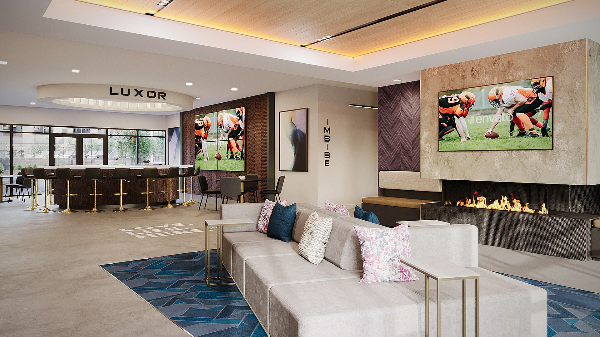 Modern lounge area with sleek bar seating, cozy fireplace, and large screen TV, ideal for social gatherings.
