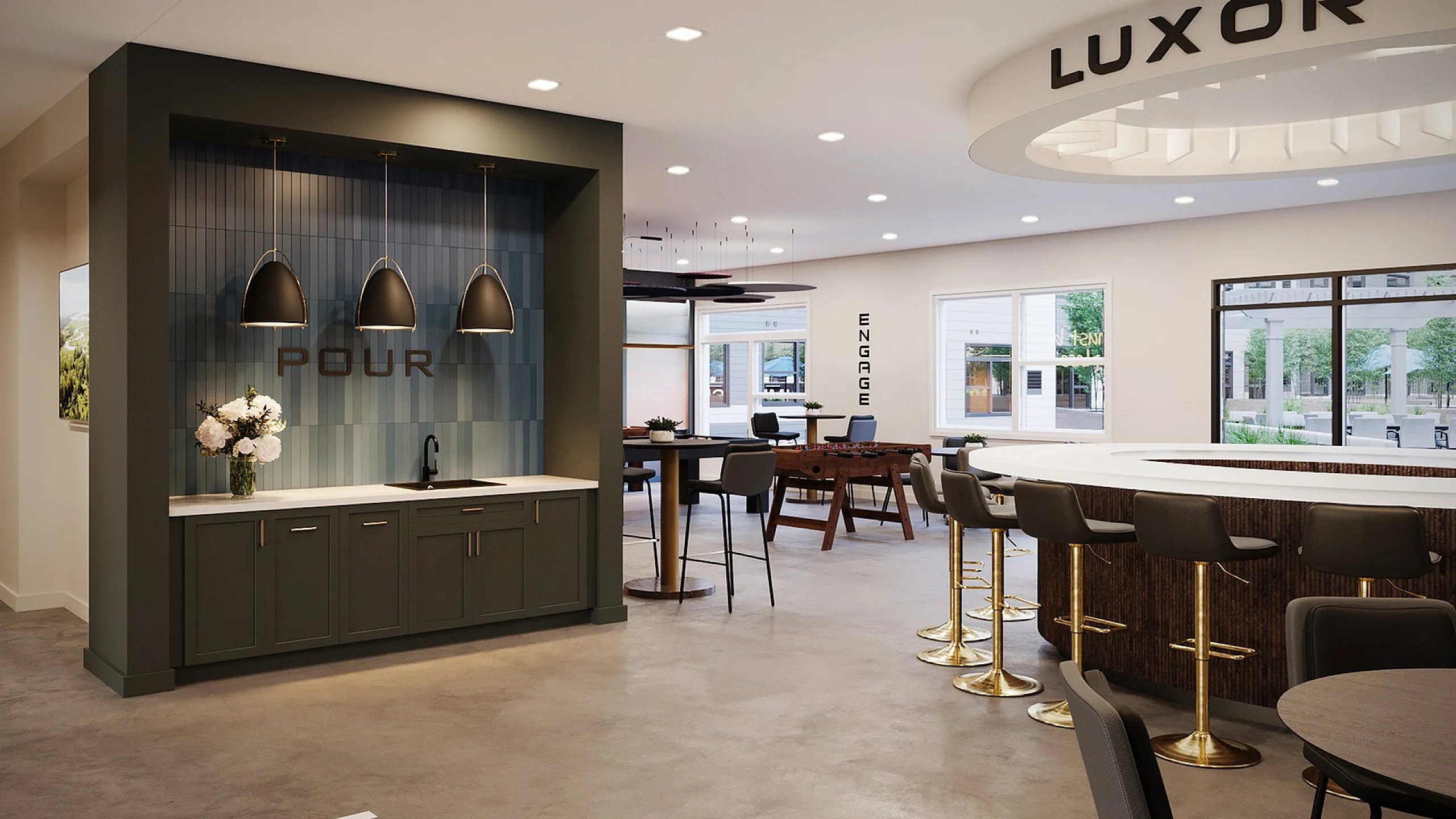 Modern communal space with chic seating, sleek bar area, and stylish pendant lighting.
