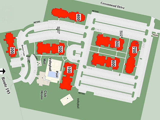 Inviting apartment complex layout with vibrant buildings, pool, volleyball court, and clubhouse for perfect community living.