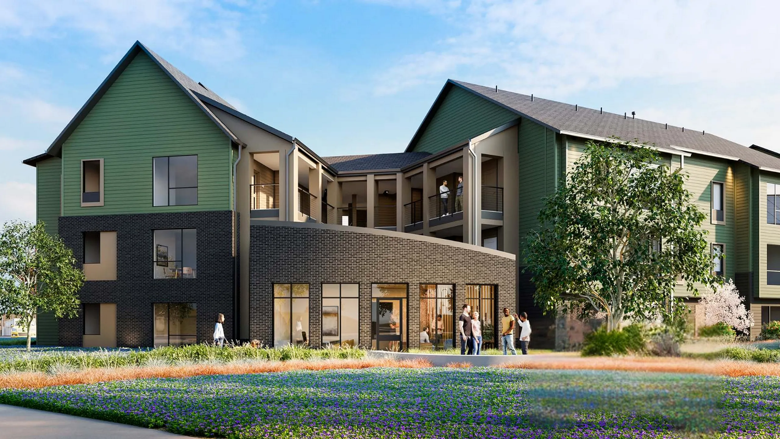 Modern apartment building with beautiful landscaping and vibrant facade.
