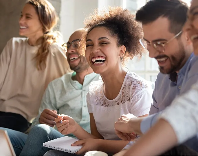 Picture of Young adults laughing and enjoying community