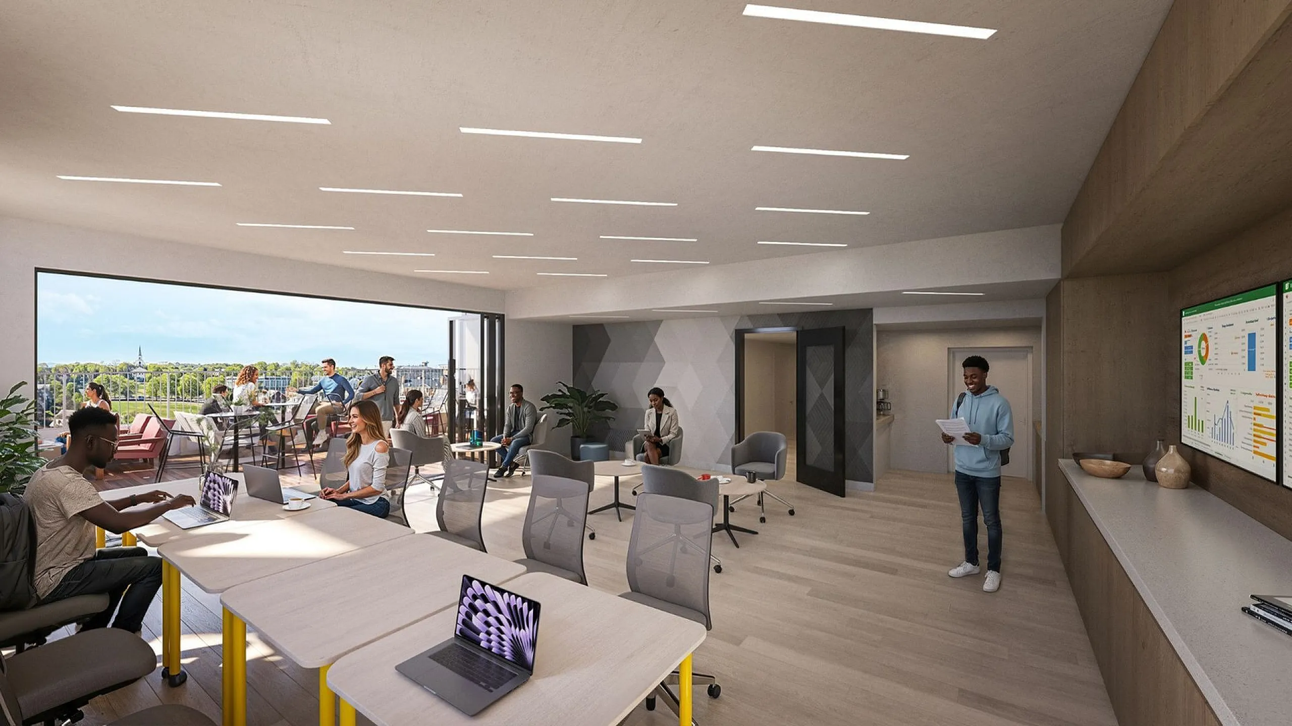 Modern communal workspace with natural light, featuring people collaborating around sleek desks and vibrant outdoor seating area with city views.