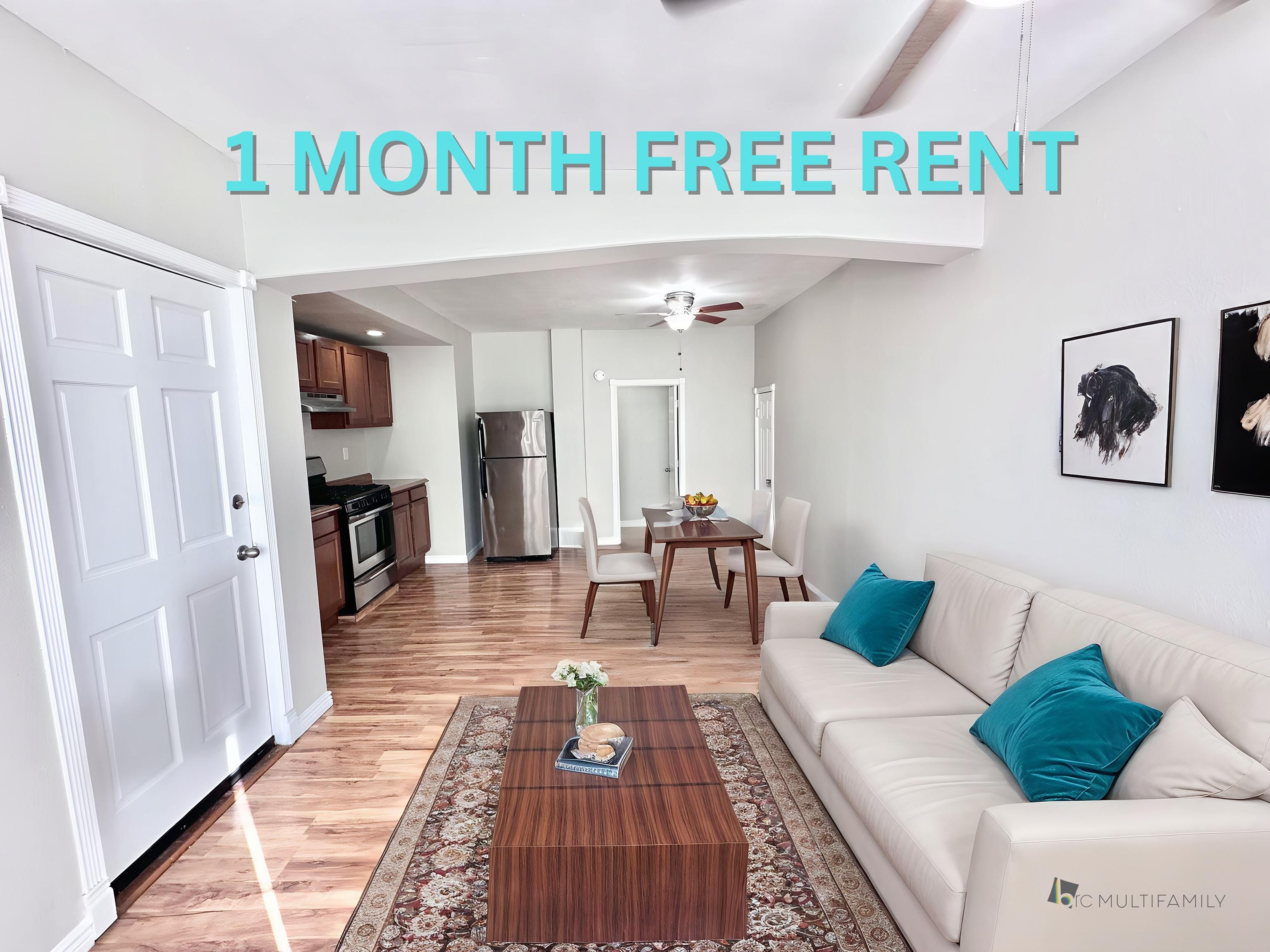 Inviting apartment interior with modern kitchen, cozy living area, and stylish dining space, offering 1 month free rent.