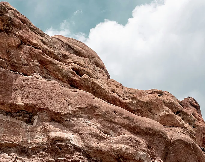 Majestic red rock formations under a vibrant sky, perfect for outdoor adventures and nature enthusiasts.