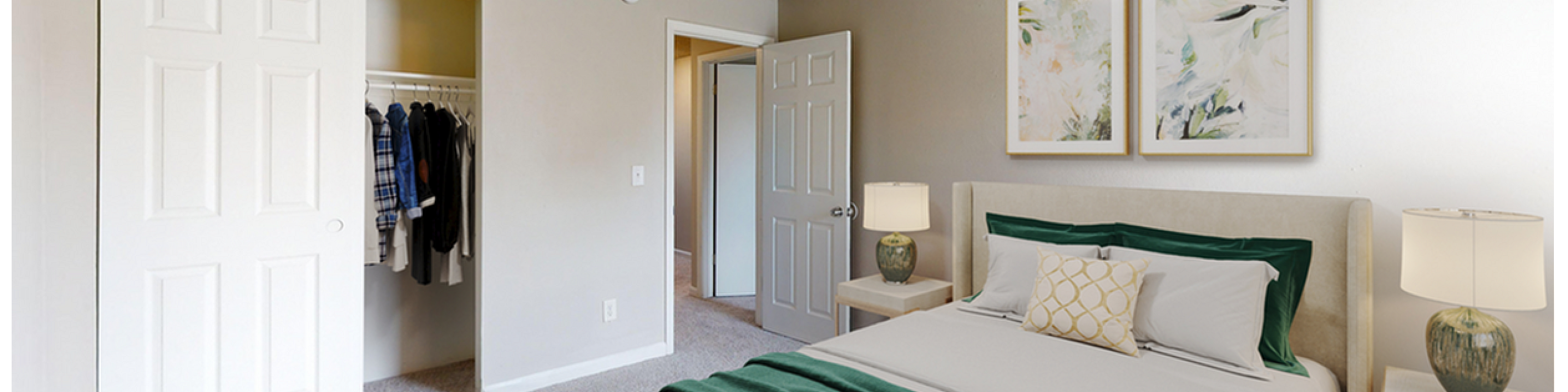 Inviting bedroom with elegant decor, featuring a comfortable bed with luxurious linens, a ceiling fan, and a spacious closet with sliding doors.