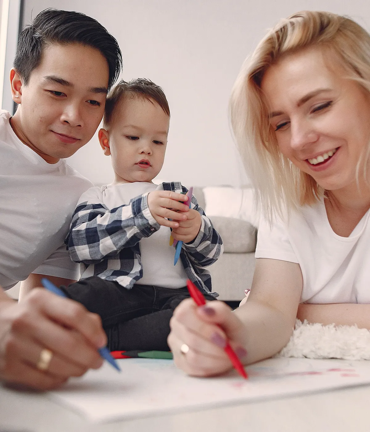 Bright and cozy family living space with a happy family enjoying creative time together.