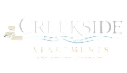 Inviting Creekside Apartments logo with serene stone and water design, located in Englewood, Colorado.