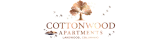 Elegant logo for Cottonwood Apartments featuring a stylized cottonwood tree with drifting seeds, located in Lakewood, Colorado.