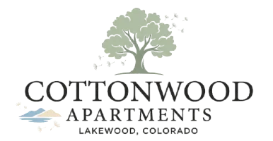 Inviting logo for Cottonwood Apartments in Lakewood, Colorado, featuring a serene tree silhouette with fluttering leaves.
