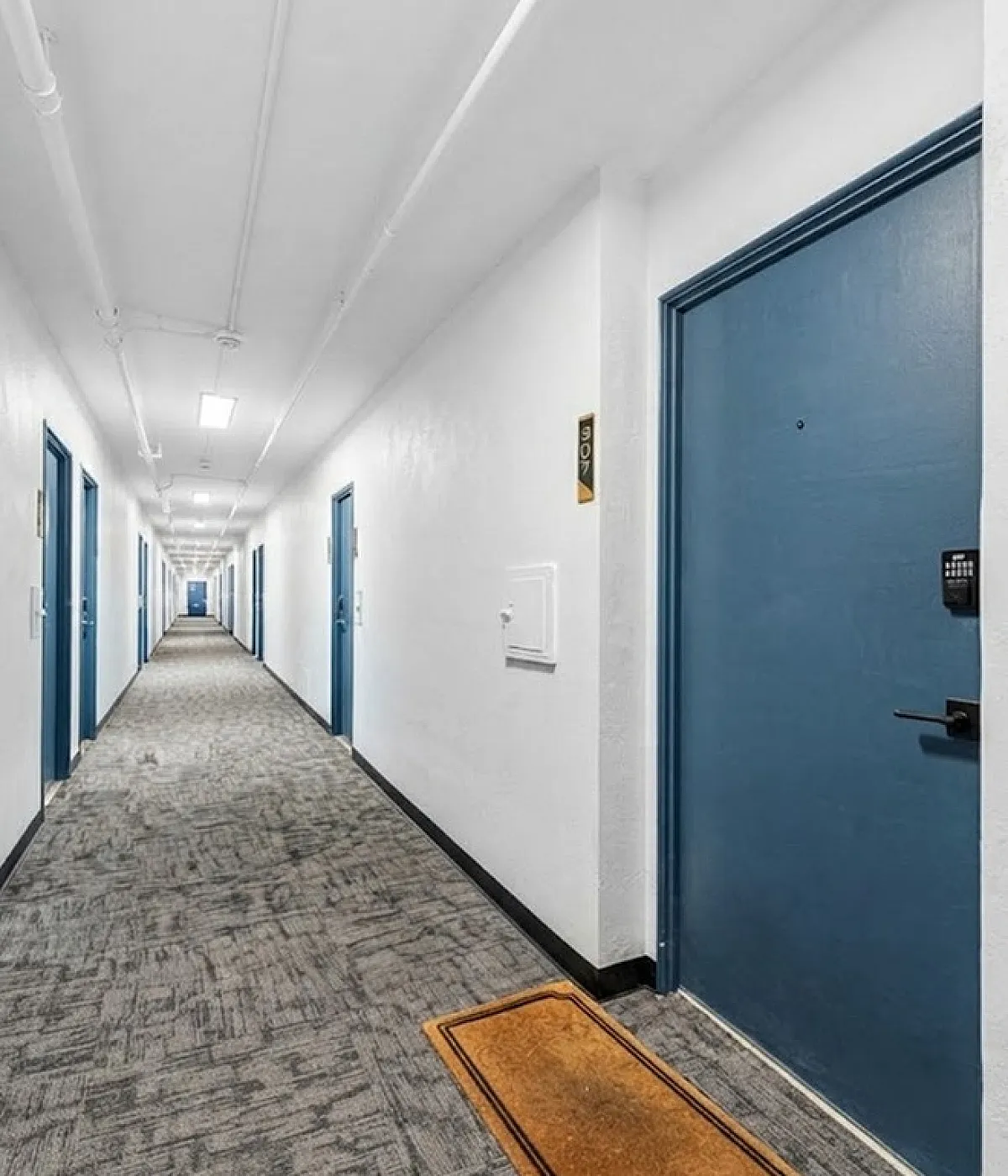 Breakaway Flats - Carpeted Hallway