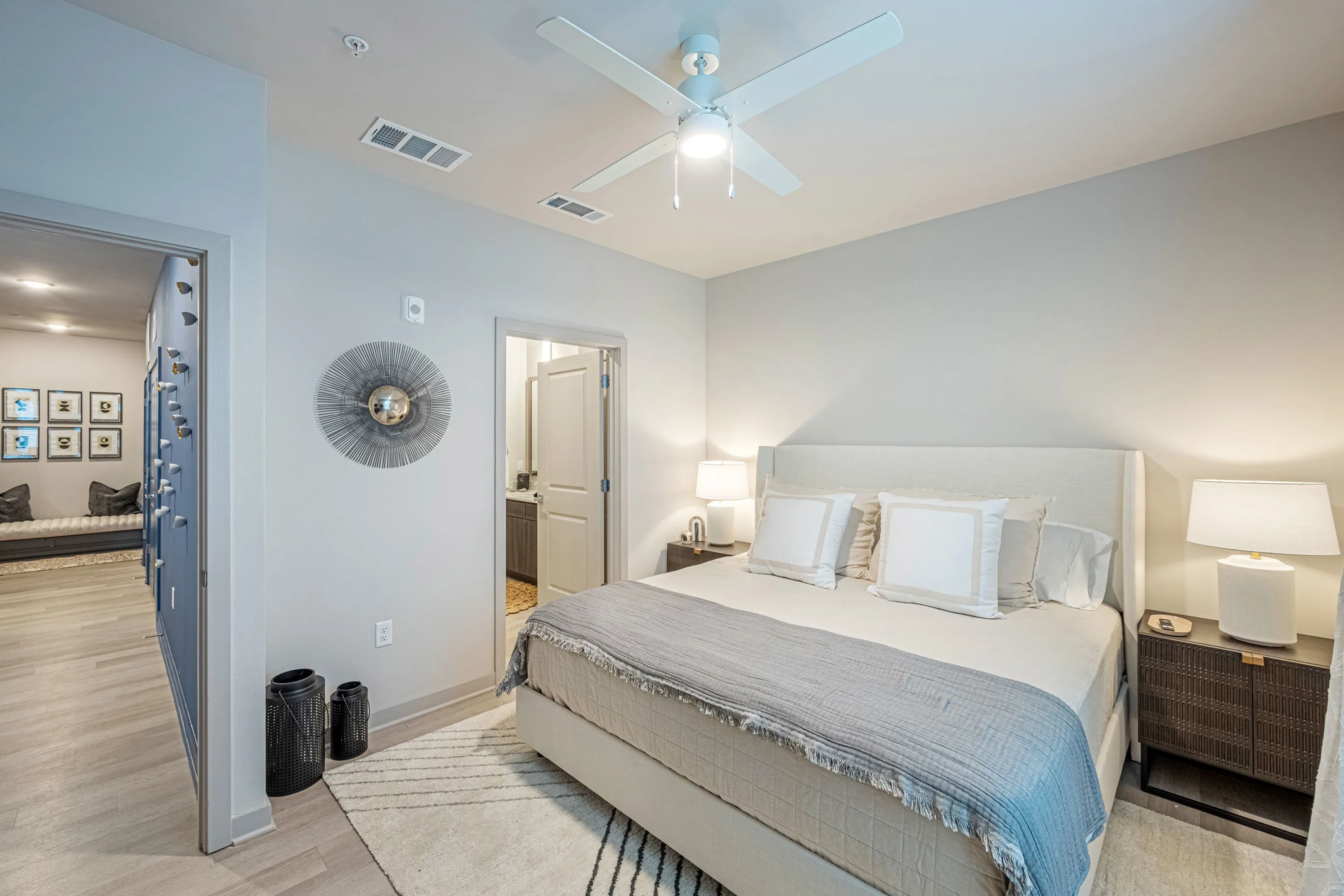 Furnished bedroom with bed and tables