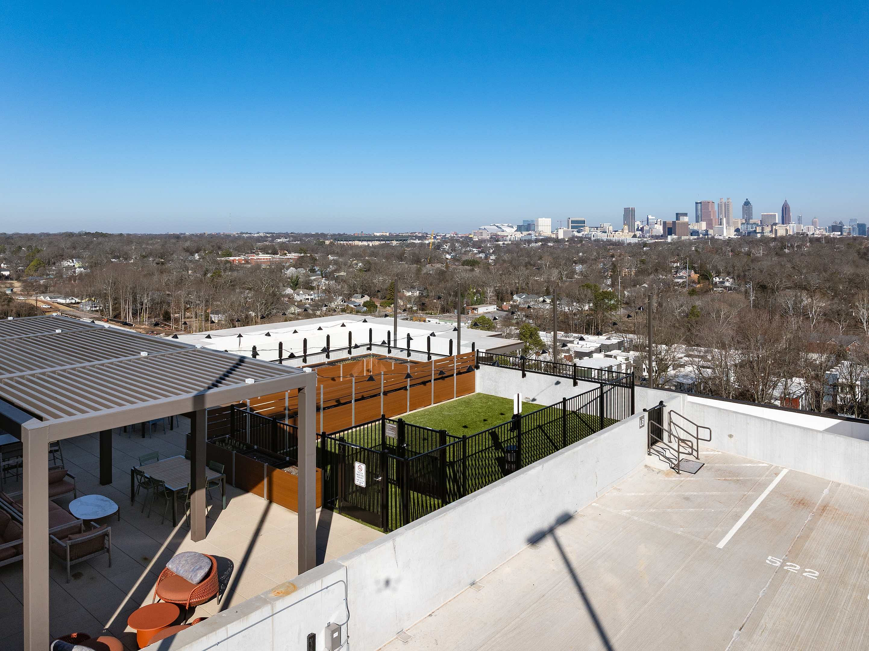 Stunning rooftop terrace with lounge area and city skyline views, perfect for relaxation and entertaining.