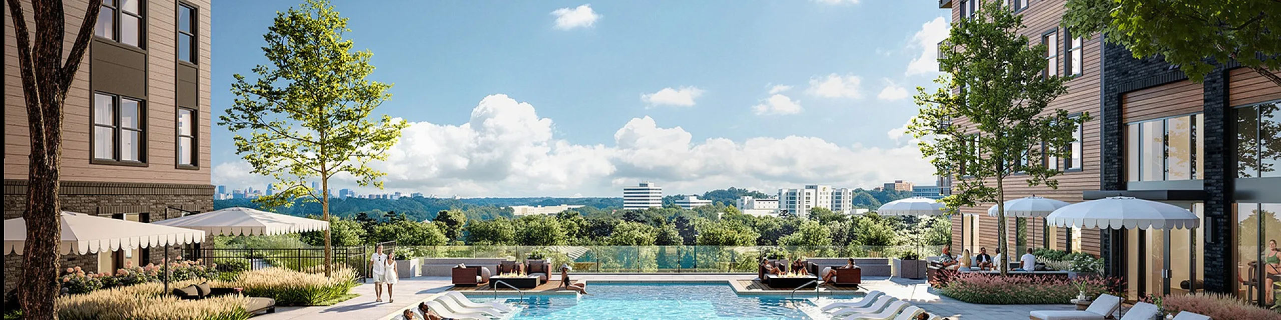 Luxurious apartment complex featuring a stunning outdoor pool with sun loungers and elegant landscaping, perfect for relaxation.