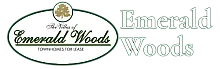 Logo of The Villas of Emerald Woods, showcasing elegant design with a tree emblem and text highlighting townhomes for lease.
