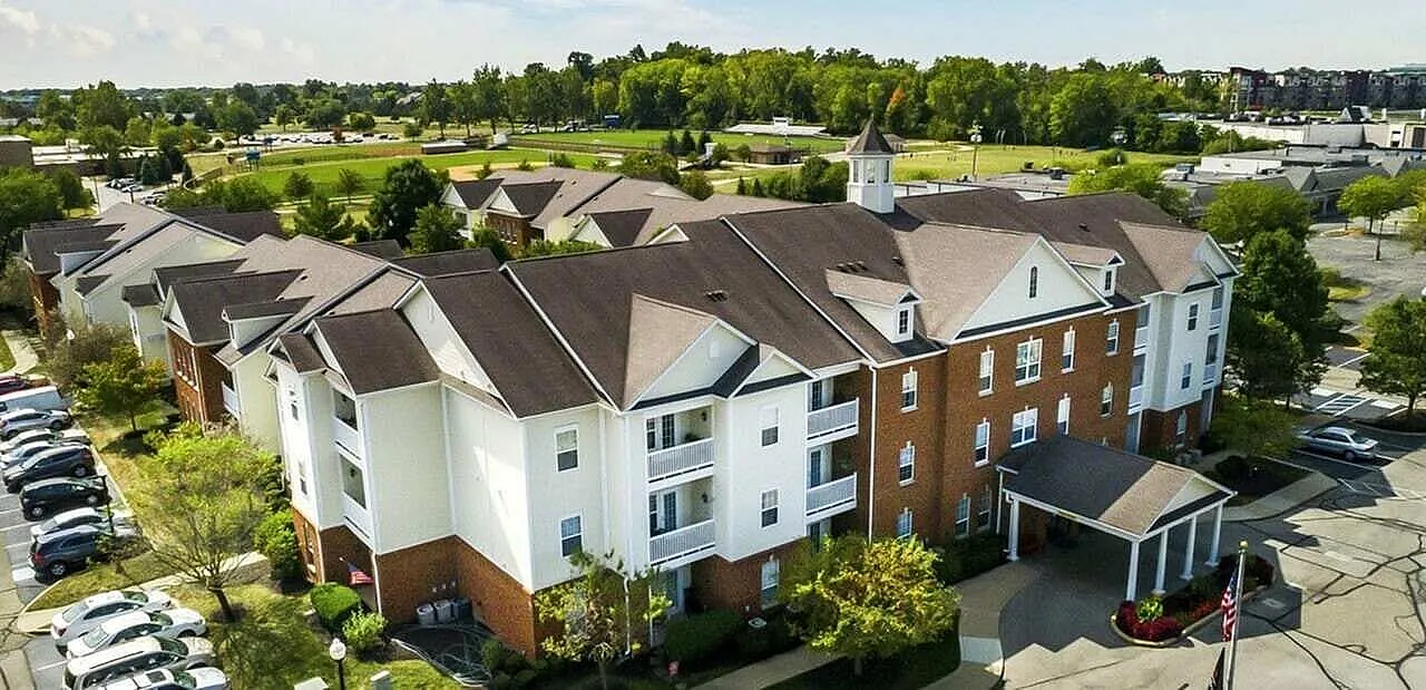 Charming apartment complex with modern architecture, lush landscaping, and ample parking, nestled in a vibrant and serene neighborhood.