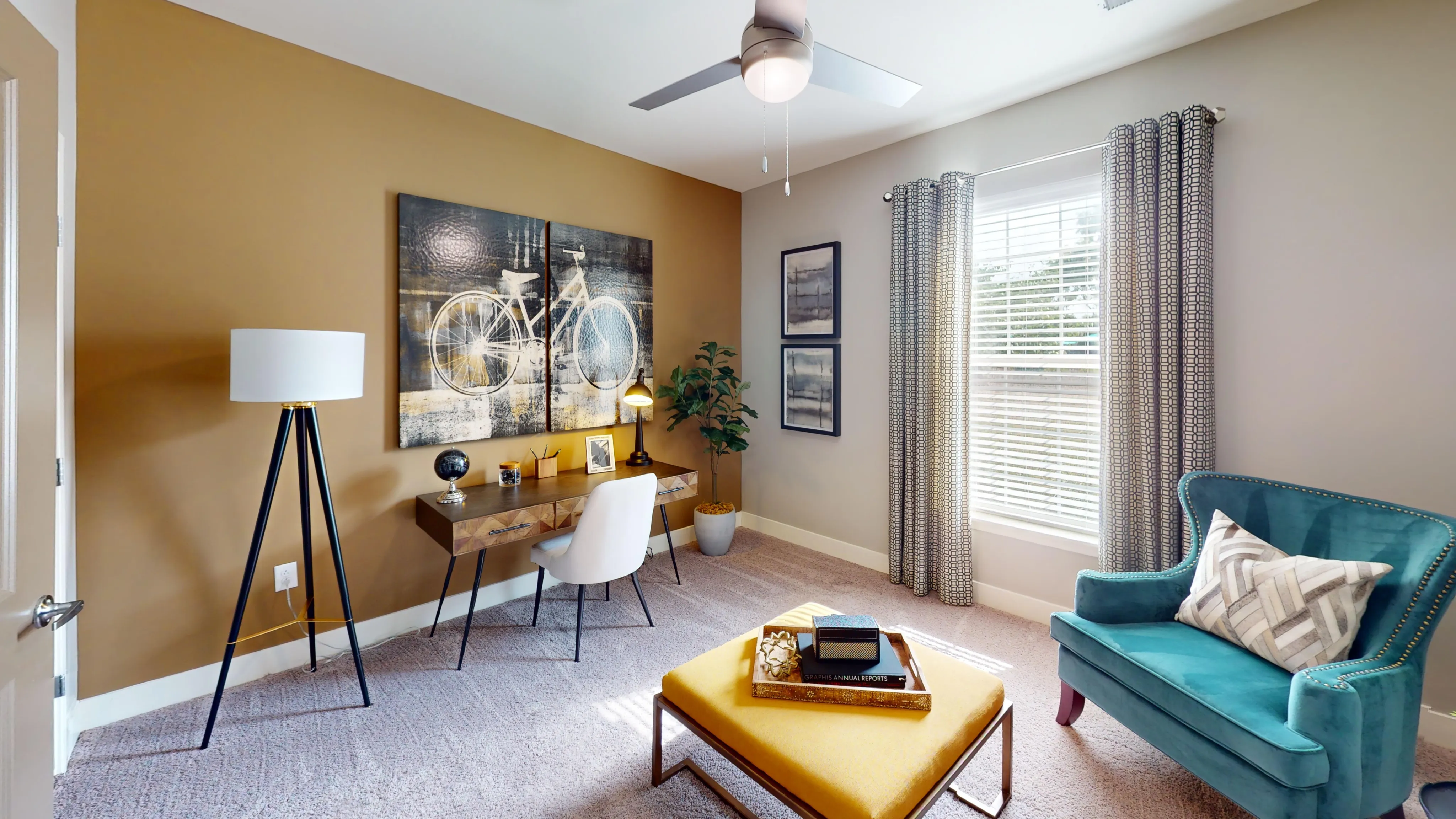 Chic home office with stylish decor, featuring a modern desk, plush seating, and vibrant art, perfect for productivity.