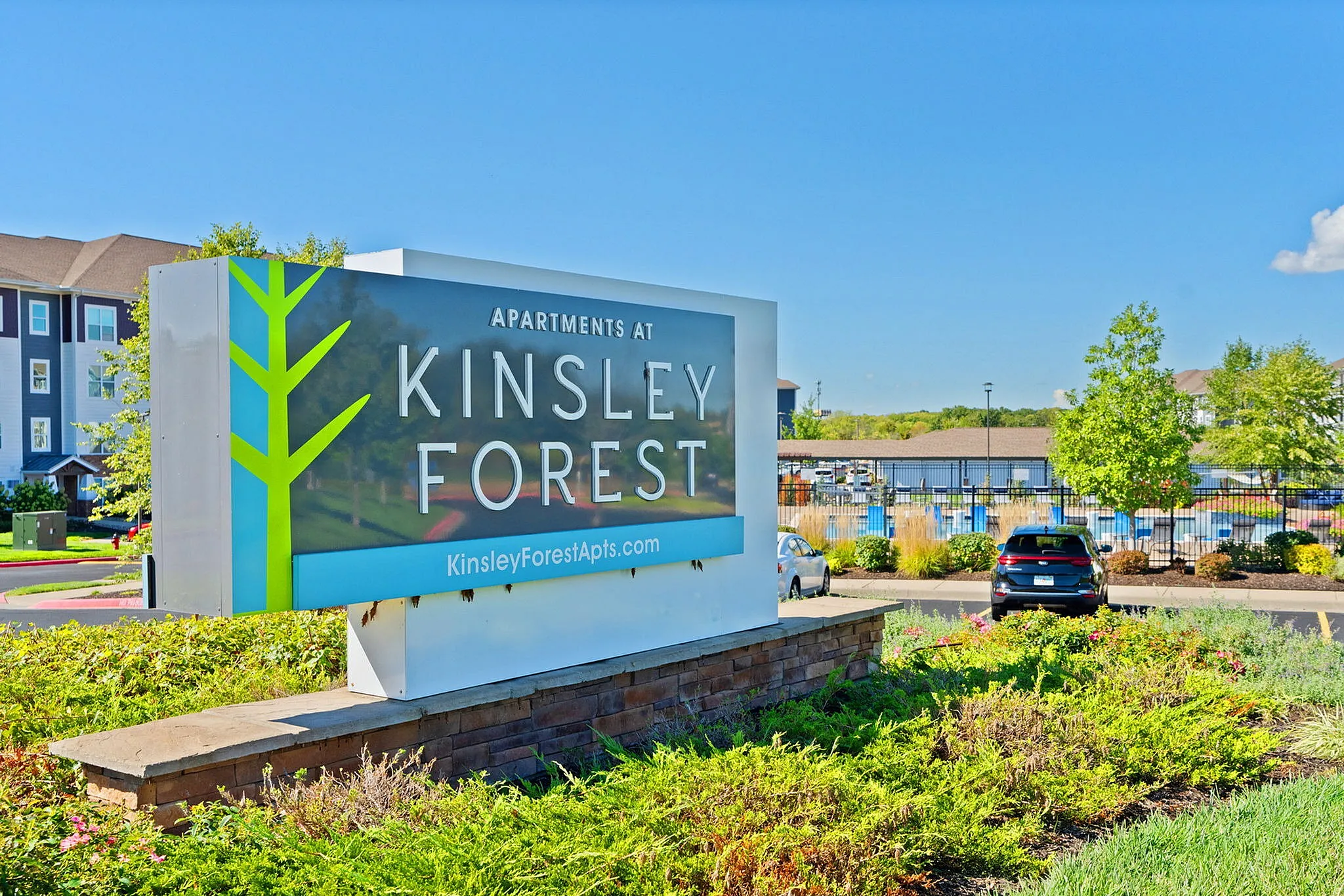 Welcome to Kinsley Forest Apartments, nestled in lush greenery with modern amenities and vibrant community vibes.