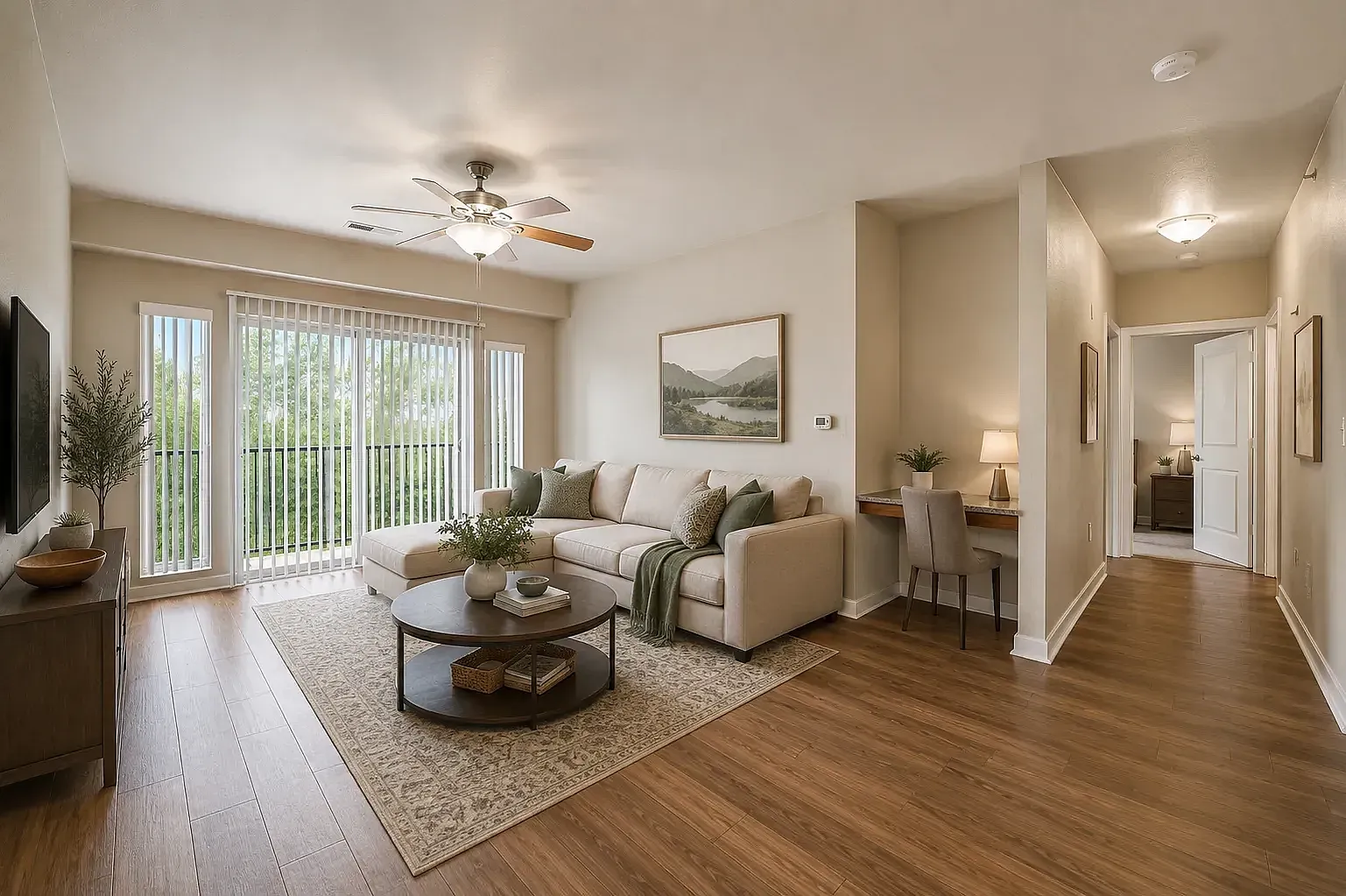 Spacious living room with luxury vinyl flooring.