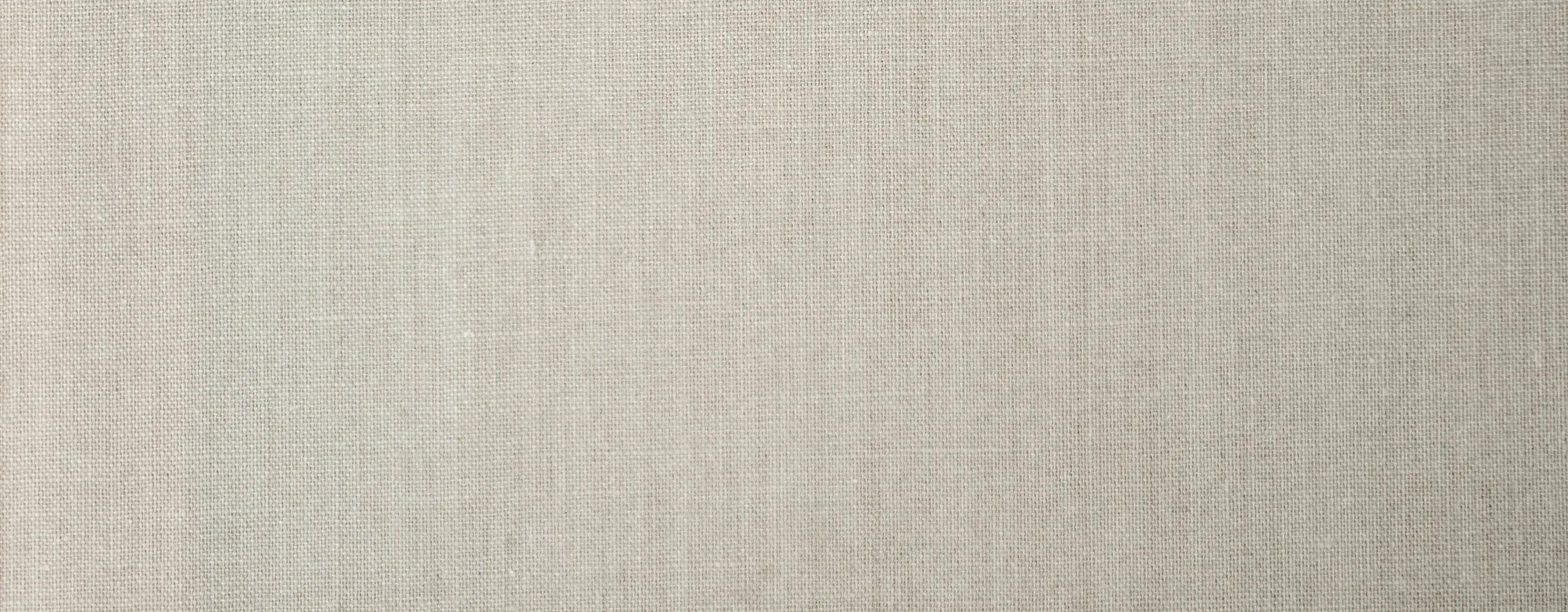 Elegant beige textile texture offering a warm and inviting atmosphere, perfect for cozy home d&eacute;cor.