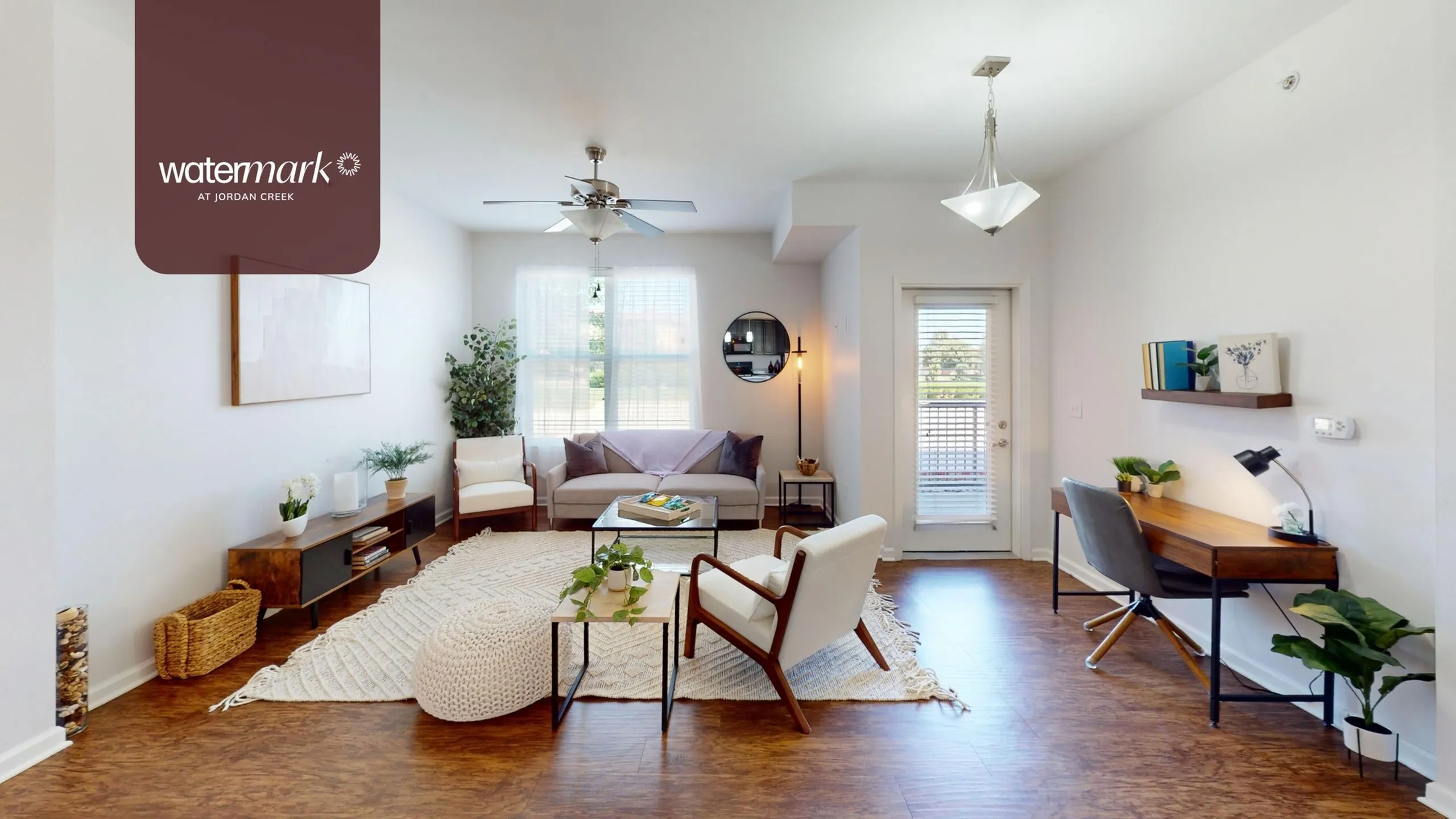 Spacious apartment living room interior at Watermark at Jordan Creek.
