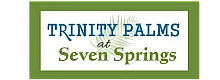 Elegant logo for Trinity Palms at Seven Springs with a palm leaf design.