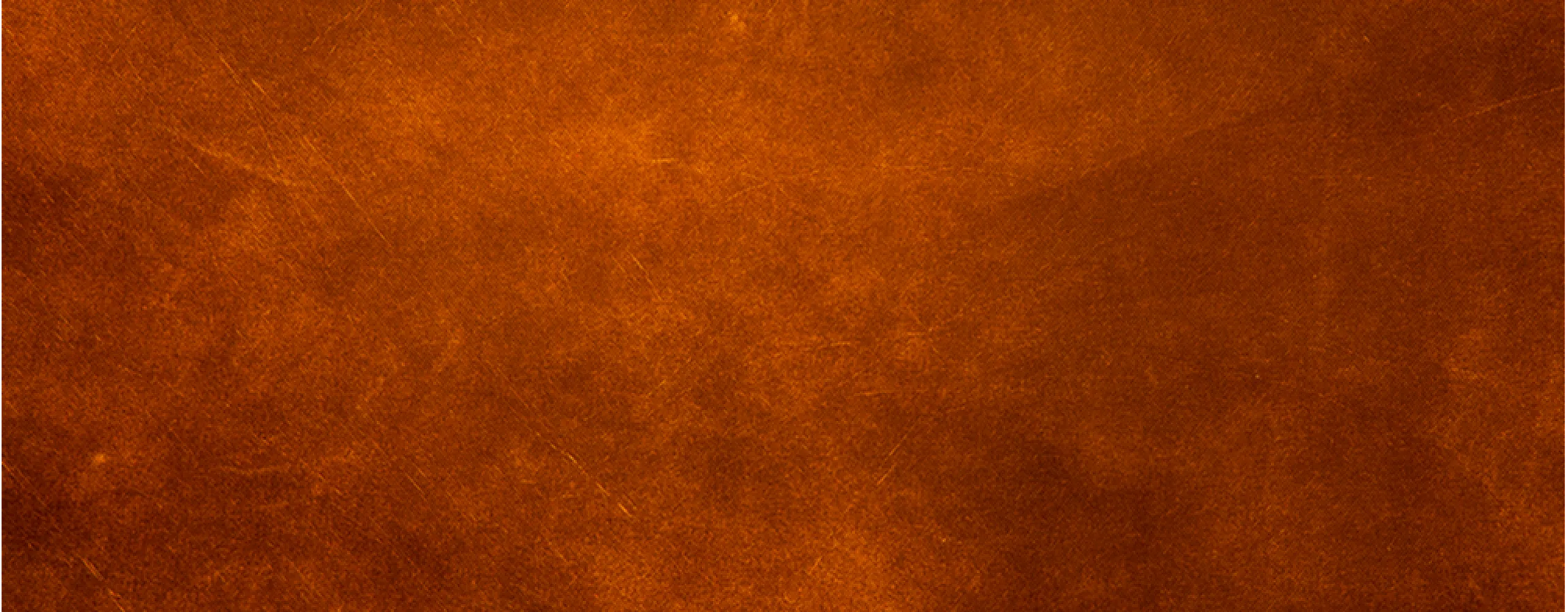 Rich brown textured surface with subtle patterns.