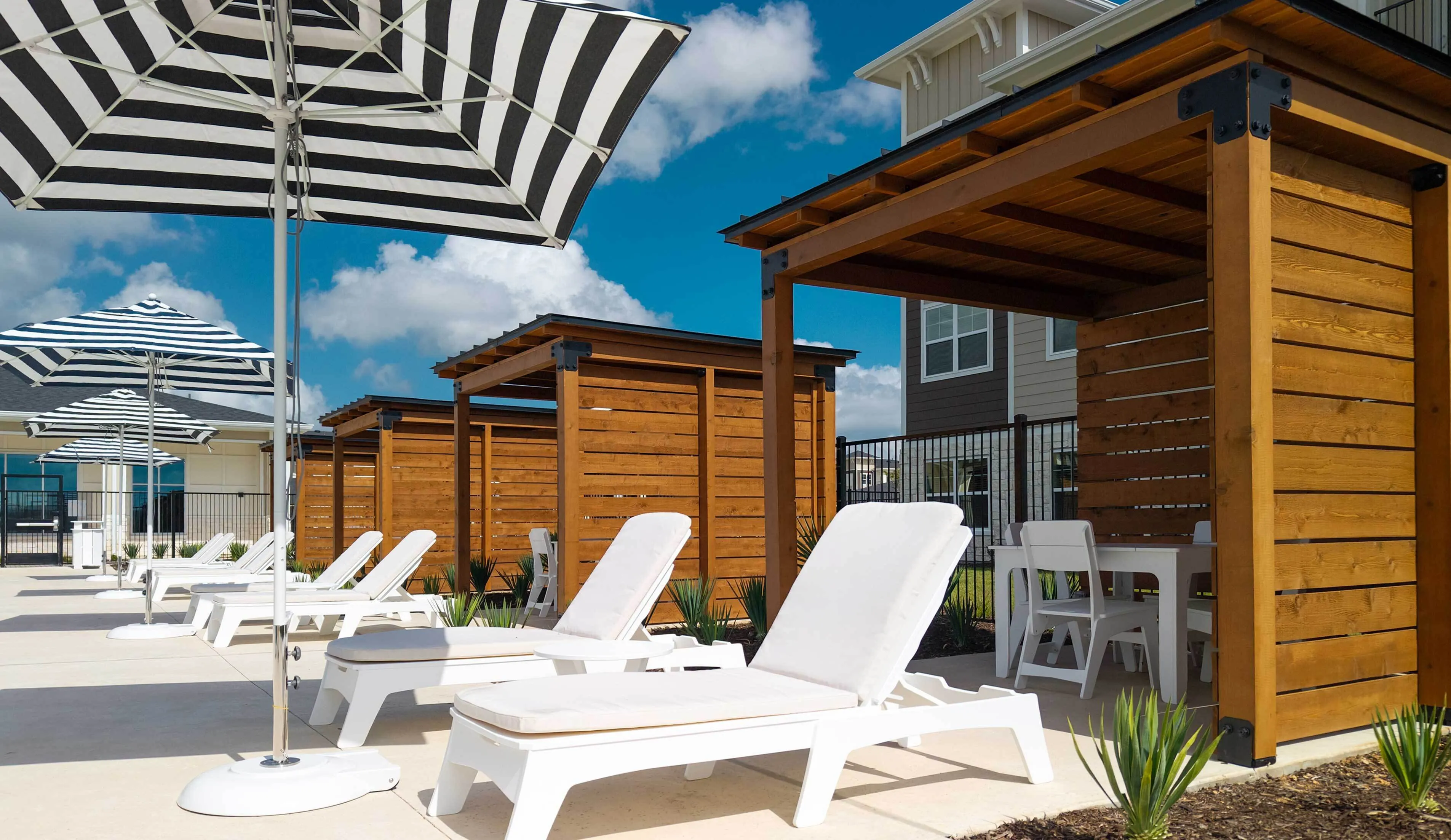 Poolside Cabanas with Sun Loungers and Umbrellas