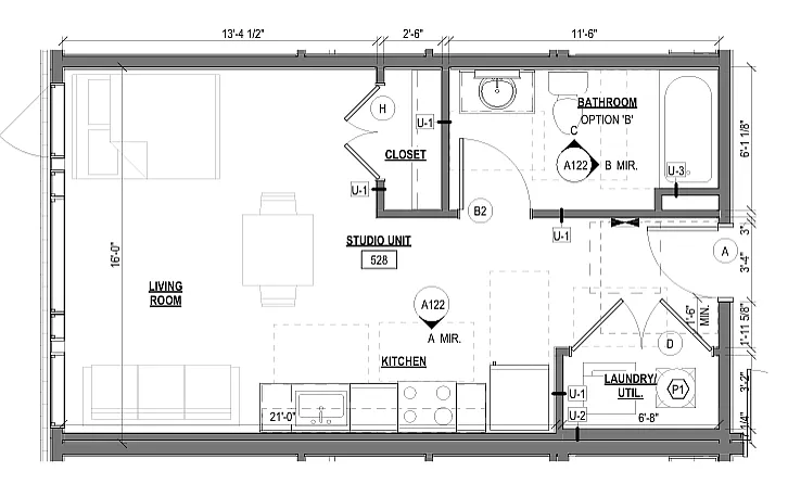 Efficient studio floor plan featuring open living area, kitchen, closet, bathroom, and laundry.