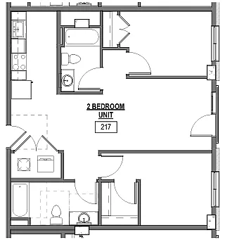 Contemporary floor plan for units 217 and 223 featuring 2 bedrooms, a well-appointed kitchen, and two bathrooms for ultimate convenience.