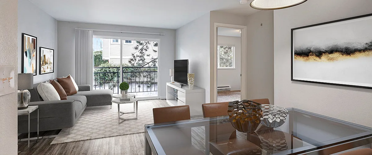 Inviting open-plan living and dining area with elegant decor, featuring a cozy sofa, large window with a view, and modern glass dining table.