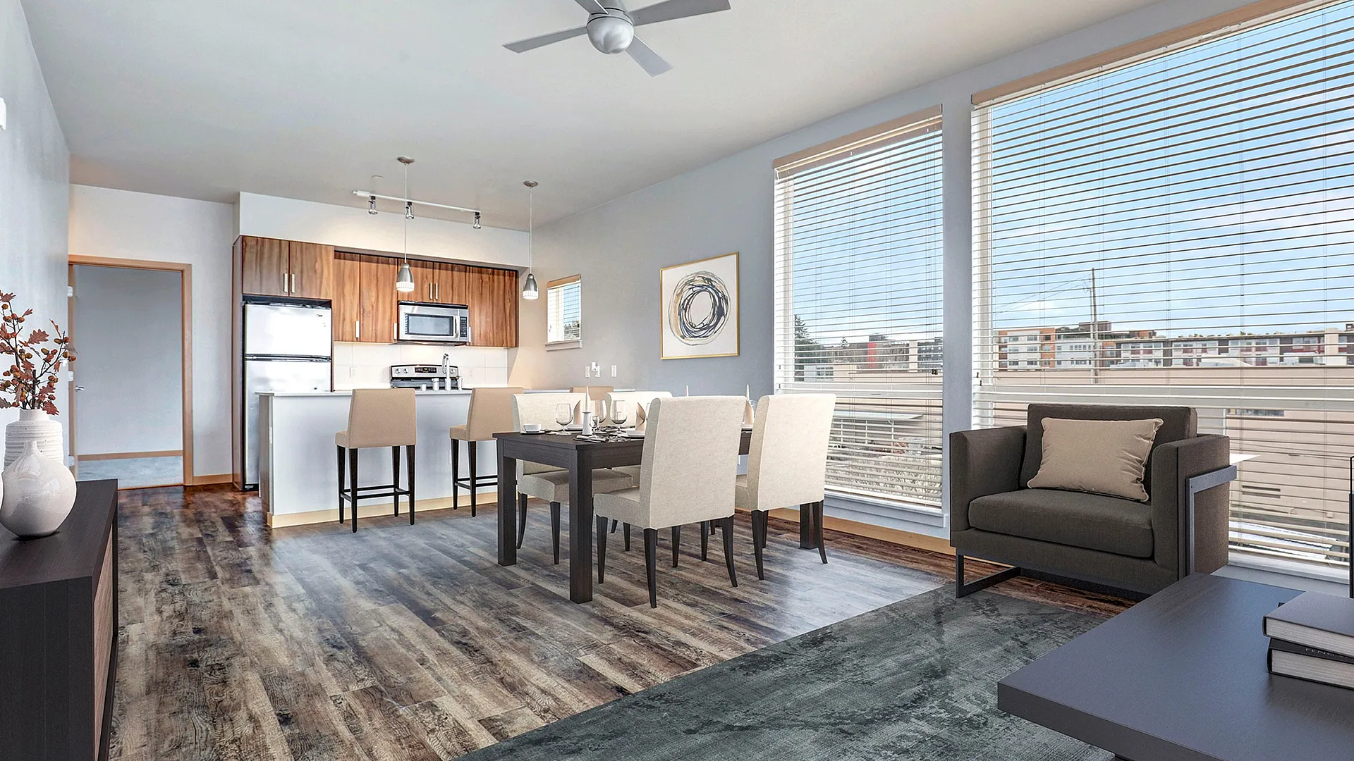 Modern open-plan apartment showcasing a sleek kitchen, elegant dining area, and a bright living room with large windows and stylish oak flooring.