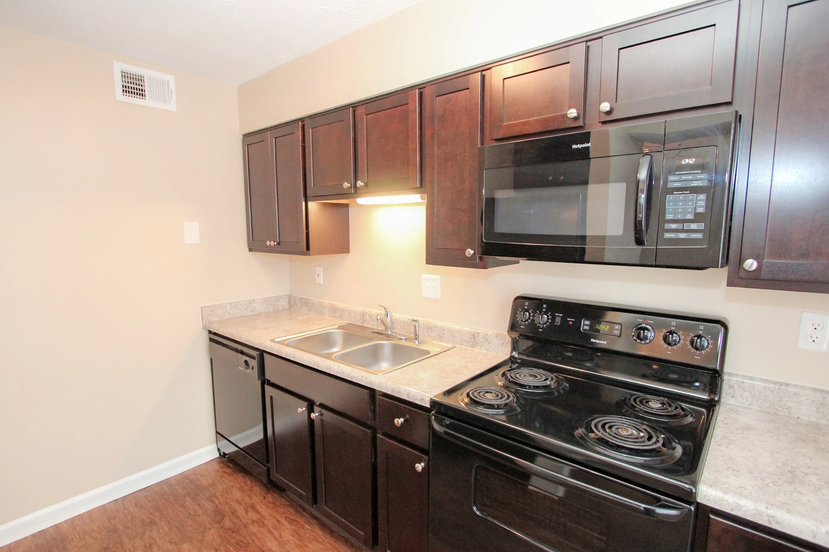 Jamestown Village Kitchen with Black appliances