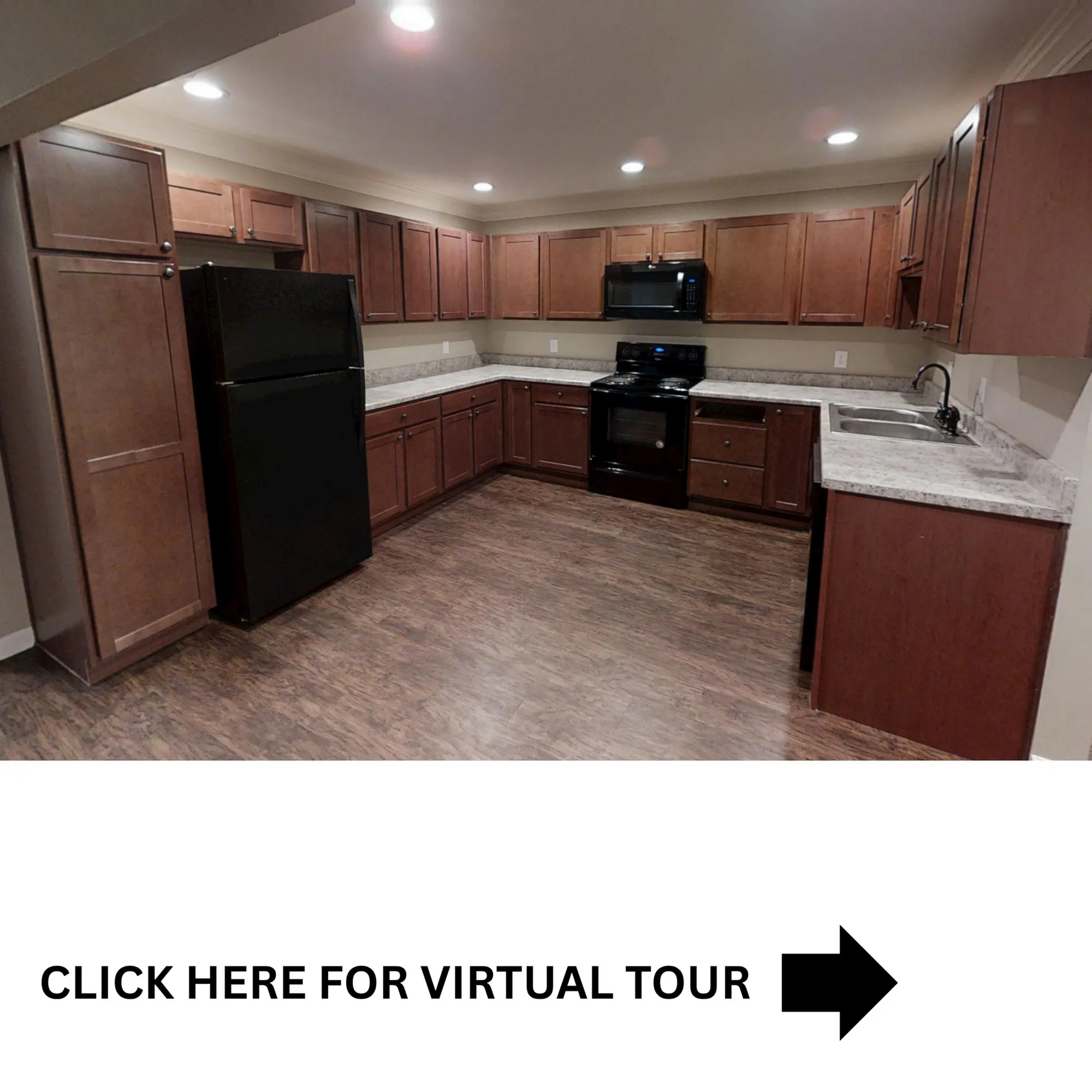 Inviting and spacious kitchen with rich wood cabinetry, modern appliances, and elegant countertops, perfect for culinary creativity.