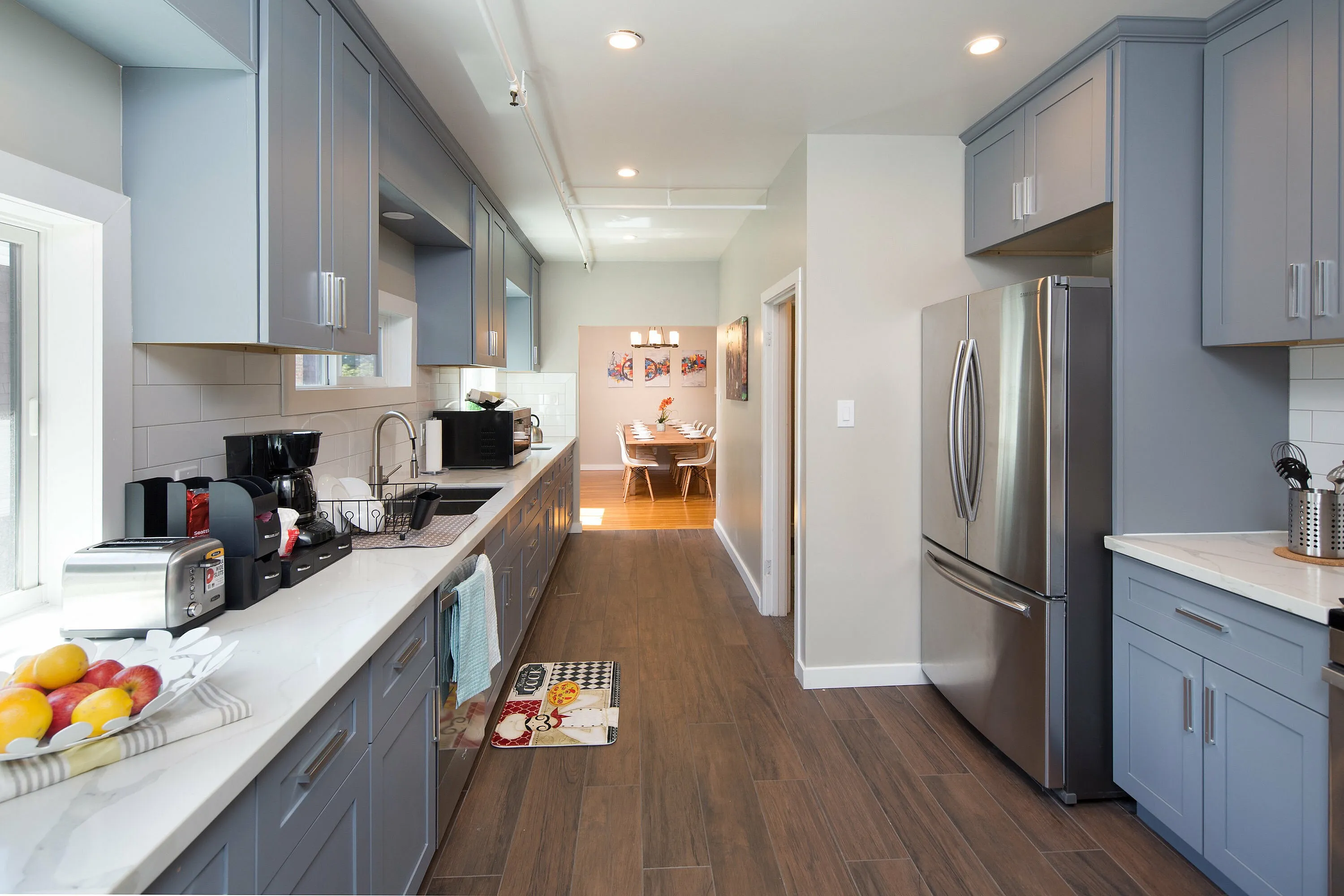 Renovated kitchen featuring sleek appliances