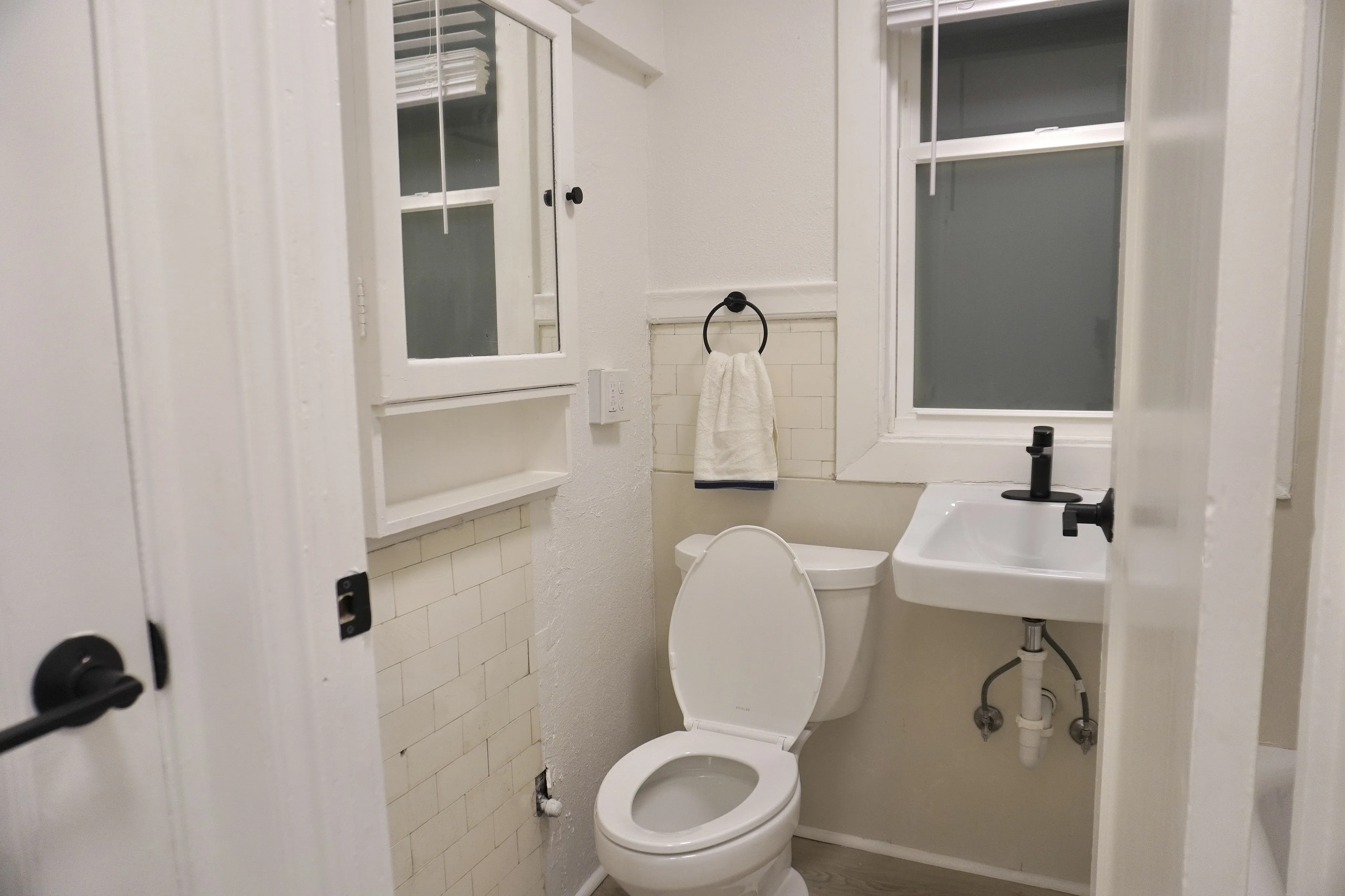 Cozy bathroom with renovated fixtures