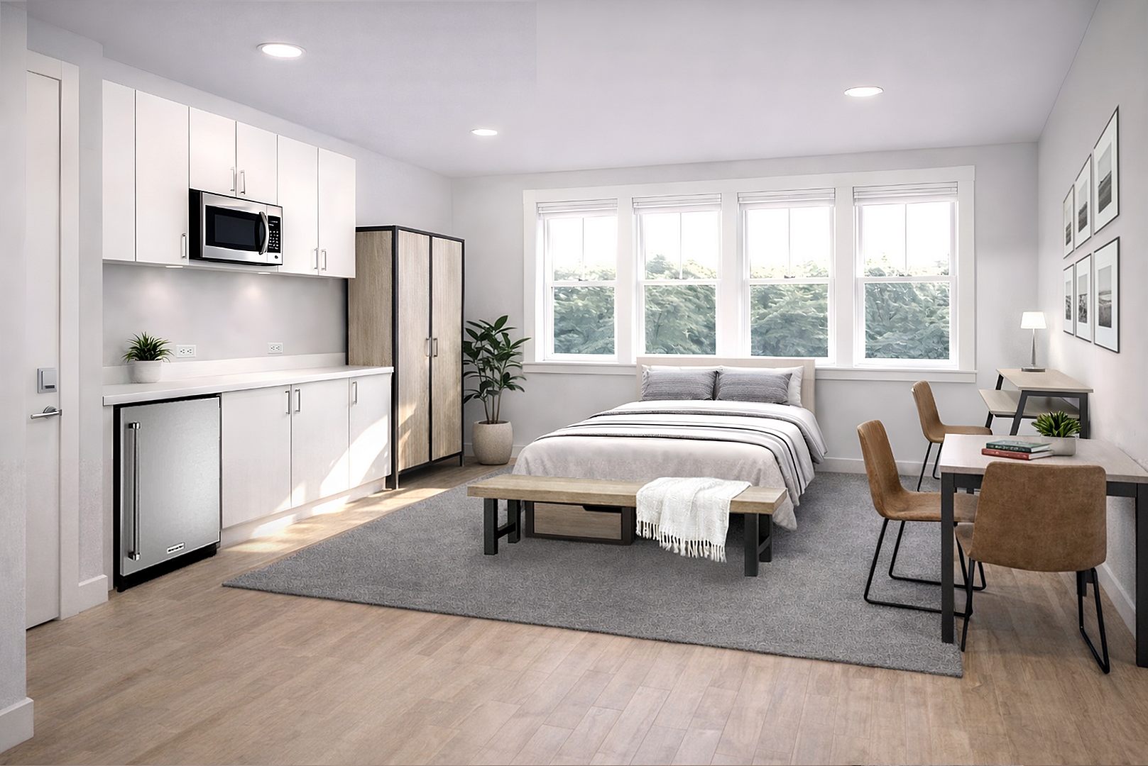Modern studio apartment with cozy bedroom, stylish kitchenette, and bright work area featuring large windows and chic decor.
