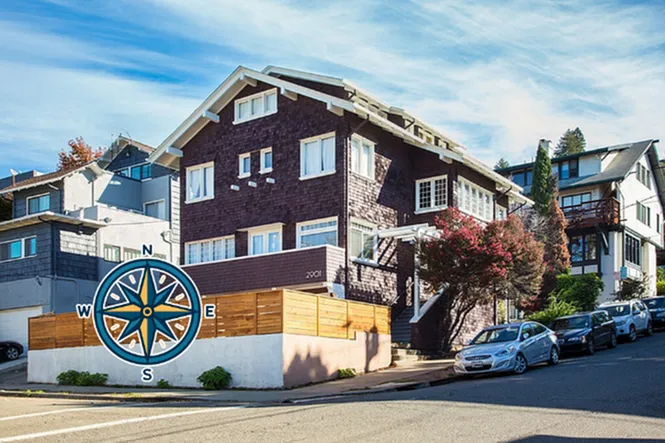 Charming multi-story apartment building with classic architecture, nestled in a picturesque neighborhood with tree-lined streets and ample parking.