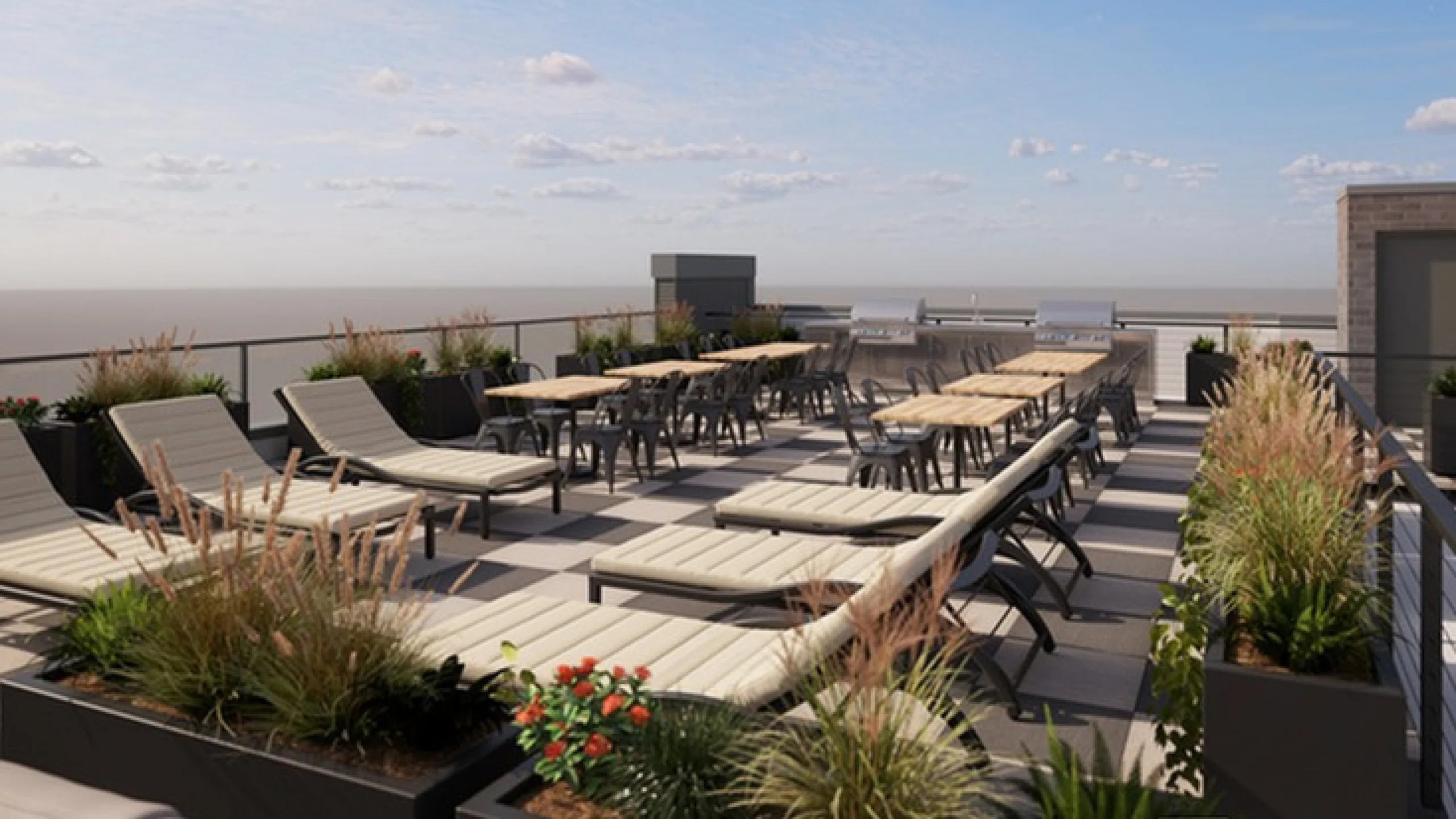 Luxurious rooftop terrace with chic lounge chairs, stylish dining area, and panoramic city views.