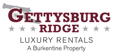 Elegant Gettysburg Ridge logo featuring a historic cannon, symbolizing luxury rentals by Burkentine Properties.