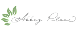 Elegant Abbey Place logo with artistic green leaf design, representing a modern and tranquil environment.