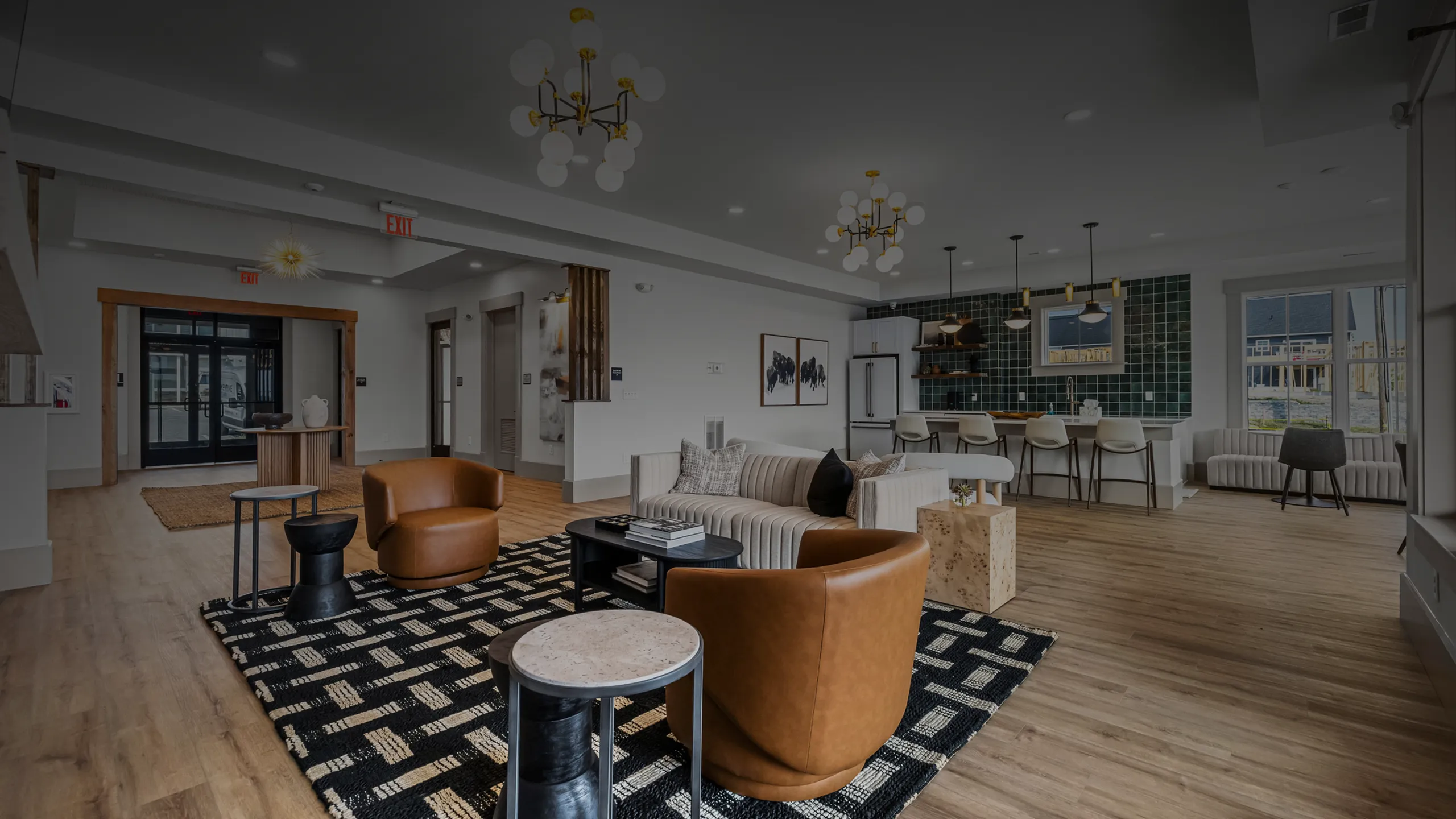 Chic open-concept apartment with stylish furniture, modern kitchen, and elegant lighting, offering a welcoming and luxurious living space.