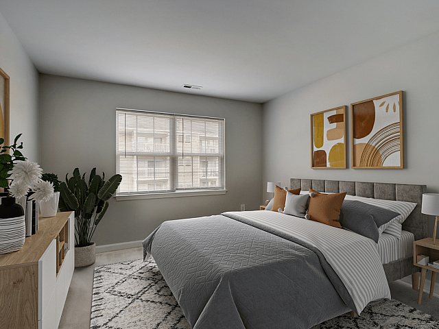 Chic bedroom with contemporary decor, featuring a cozy bed with stylish pillows, modern artwork, and natural light streaming through large windows.